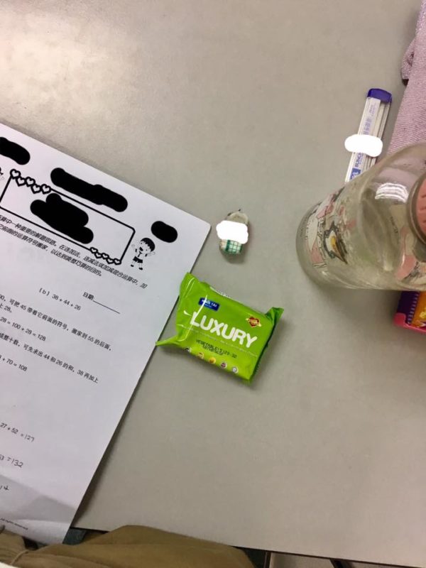 Biscuit pack next to a student work