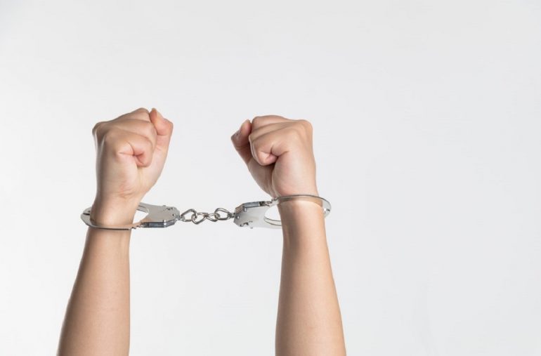 handcuffed man