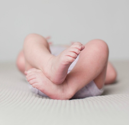 Baby’s feet showing diapers. Mummy Hacks to Make Diaper Changing