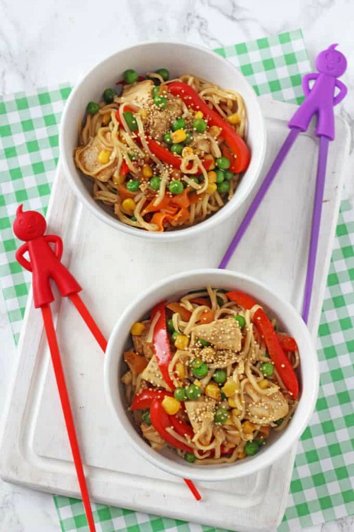 Colourful noodles picked up with red chopsticks. Easy Toddler Meals, Recipes Malaysia 