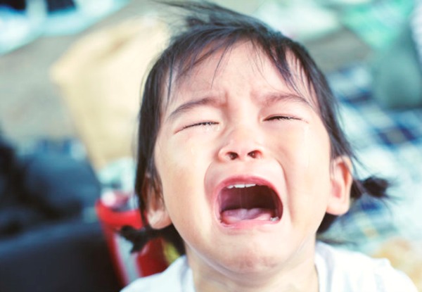 A crying child’s face. 6 Reasons Why Your Toddler is Throwing a Tantrun