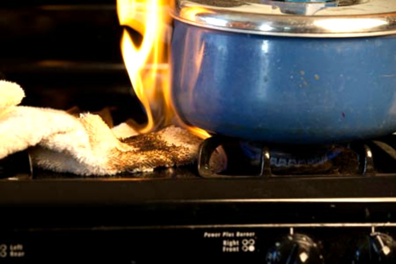 Be careful of flammable objects or fabric that could catch on fire. Most house fires start in the kitchen and most accidents are due to human error and carelessness. (Image Credit: HealthFacts.Ng)