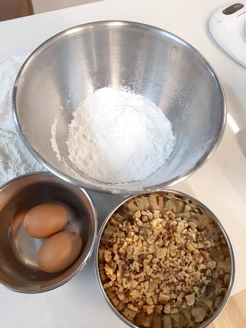 The flour, the chopped walnuts and the eggs required for Hup Toh Soh.
