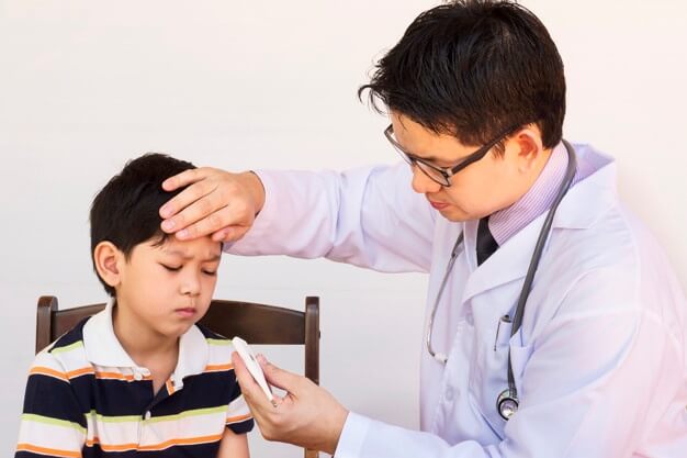 a child is sick with a doctor