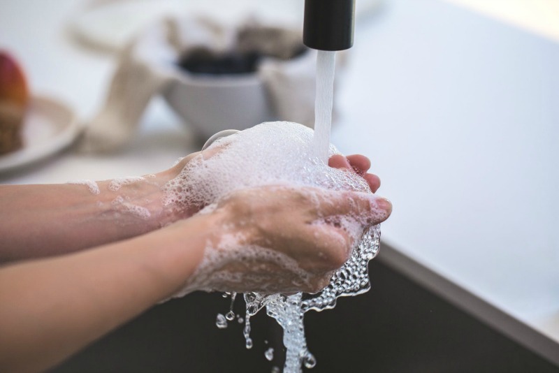 Wash your hands often, avoid touching your face, practice social distancing of at least 1m apart, take a full bath after coming home from grocery shopping, disinfect surfaces often and all should be well in time to come.