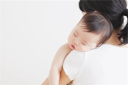 Mother Holding Sleeping Child - the sweetness of motherhood