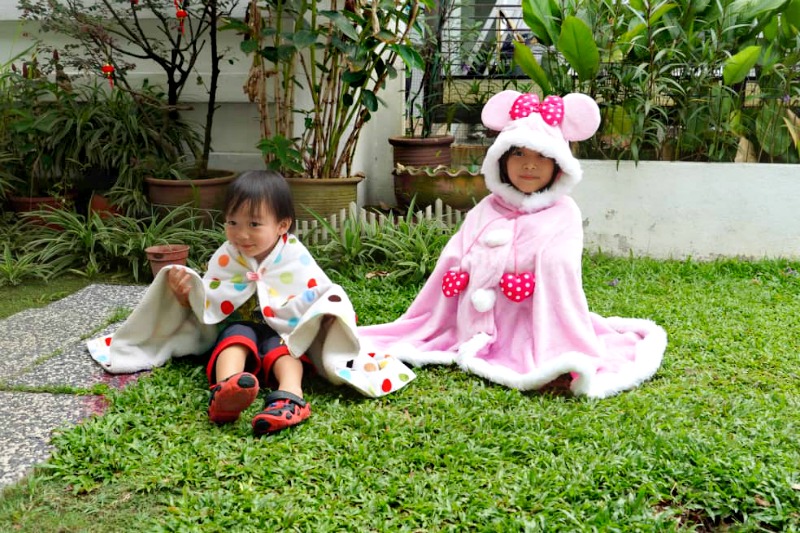 Happy children: Sylvia and Oliver playing around the house and in the garden as one of their daily MCO activities.