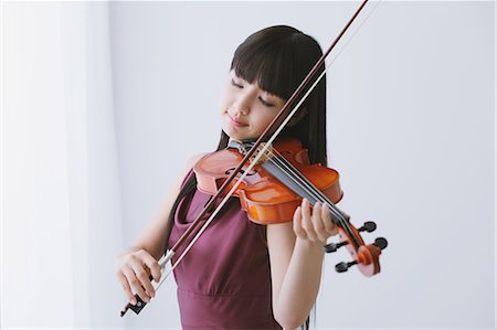 Woman Playing Violin in this new norm
