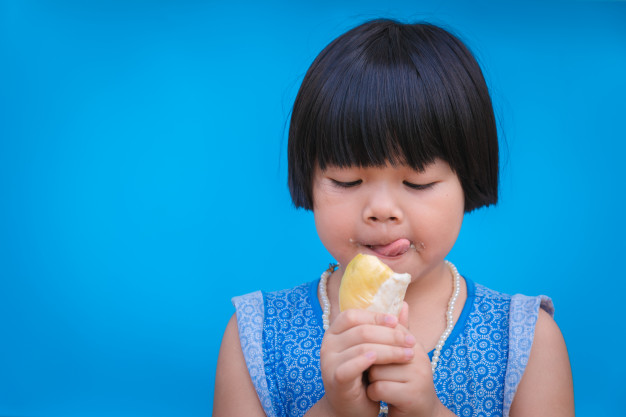 Girl Eating Durian