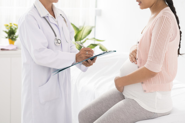 Pregnant Woman In Consultation