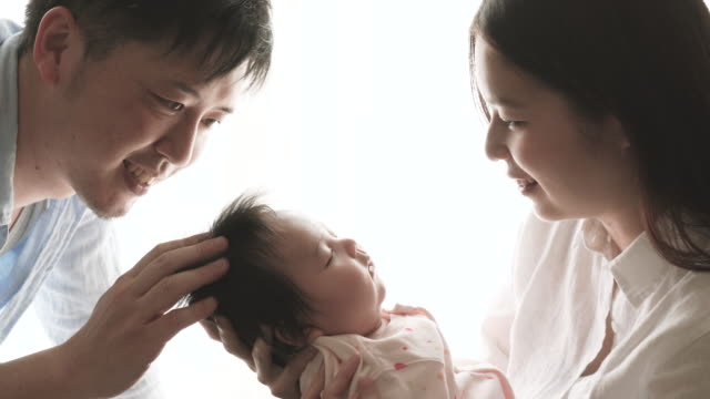 Happy Family With Baby