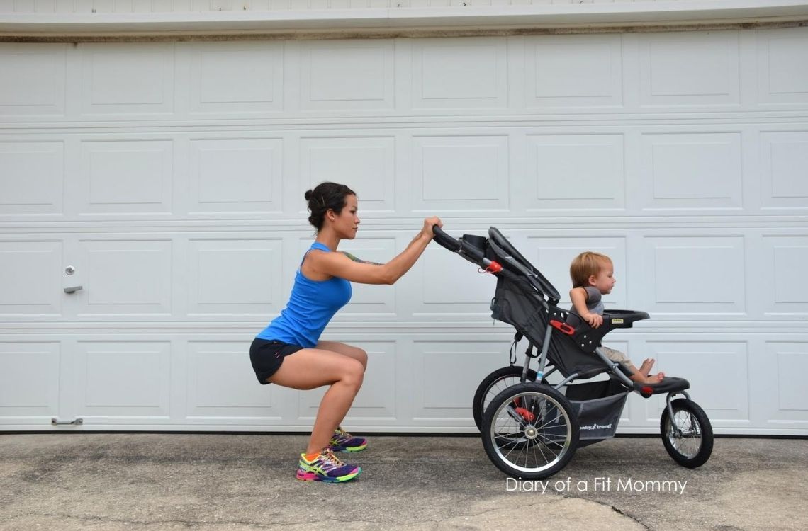 woman workout - stroller squat