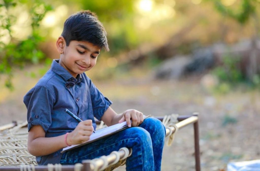 indian kid write journal
