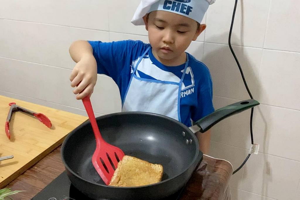 son cooking grilled cheese sandwich