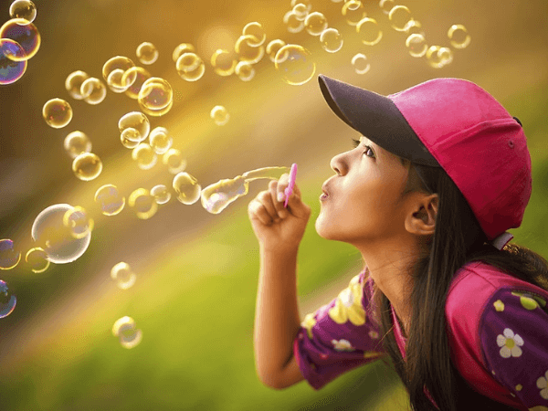 kids blow bubbles to calm down