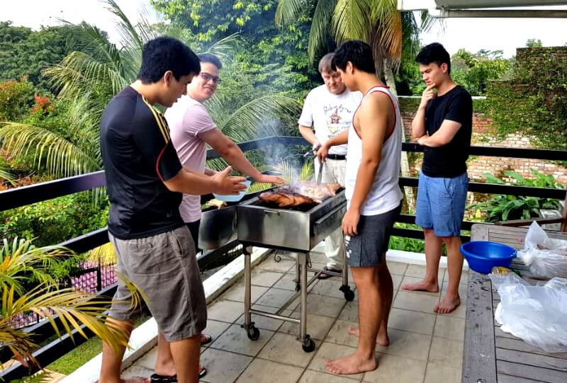 Lessons Learnt: Alex, Ryan, Joshua and James barbequing with their Dad. 