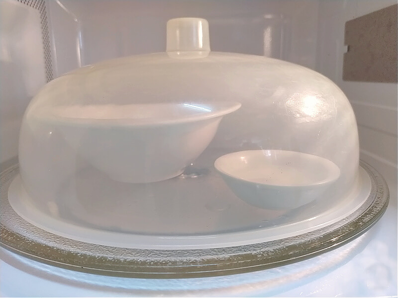 Household hack: Alternatively, you can buy a microwave cover to place over the food you are heating to prevent moisture loss. For good measure, place in that saucer or soy sauce bowl of water with the food you are microwaving.