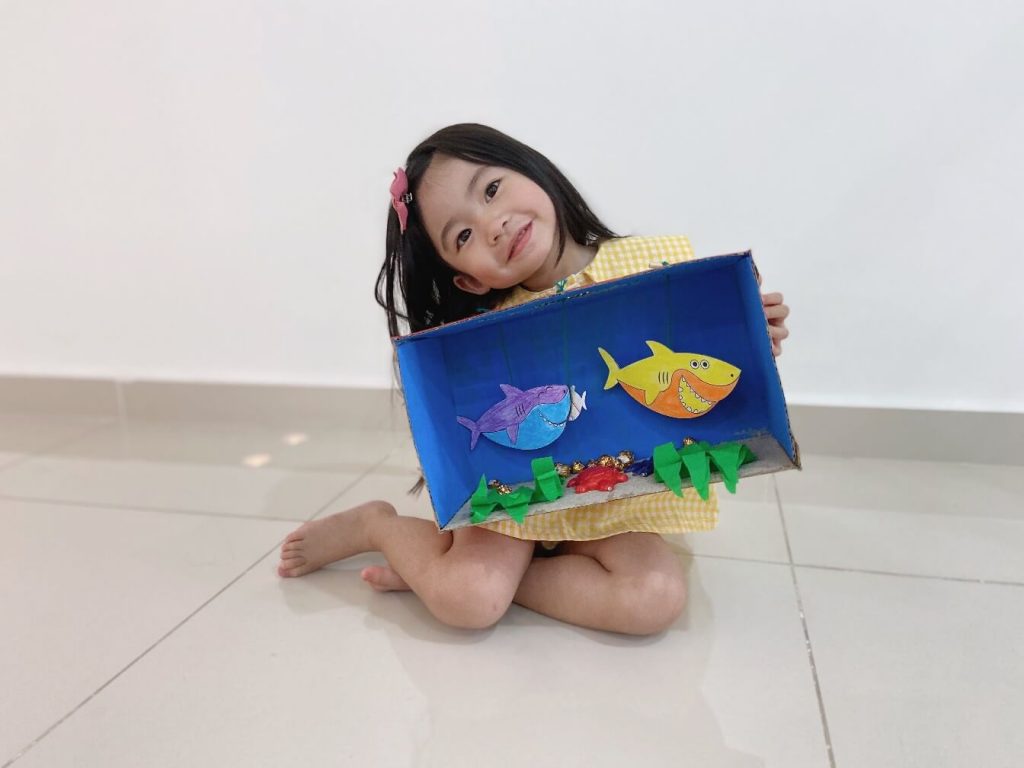 Bei En happily showcased her aquarium diorama from her online preschool 