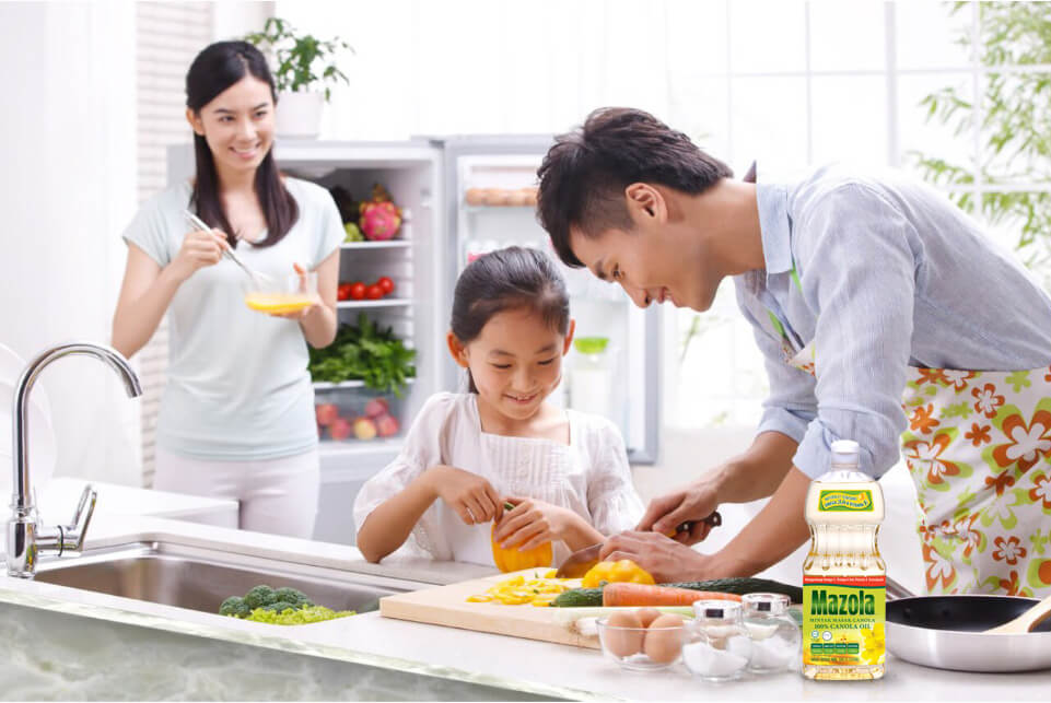 family cooking using Mazola™ Cooking Oils