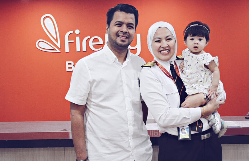 Amira with husband and daughter.