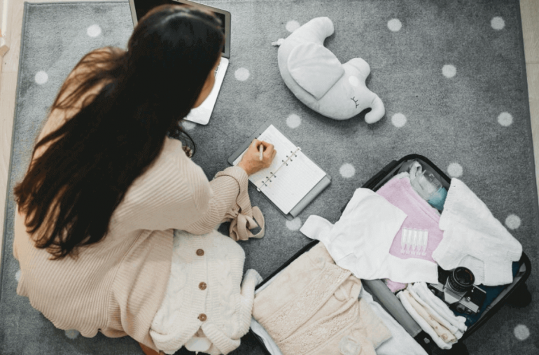 Hospital bag checklist infographic with packing essentials for mom and baby