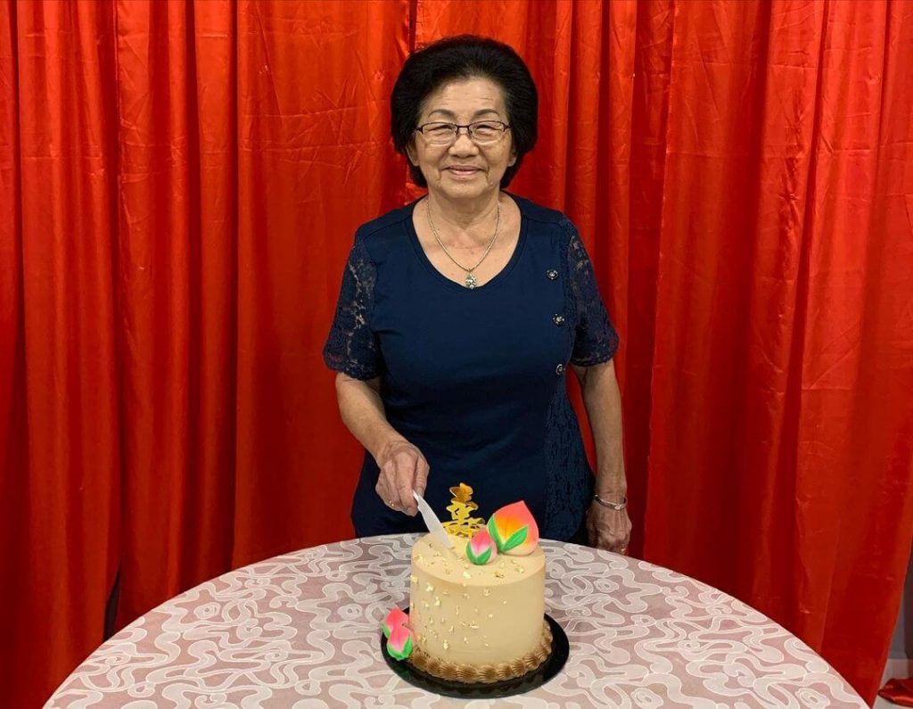 My grandmother smiling broadly during her 79th birthday celebration