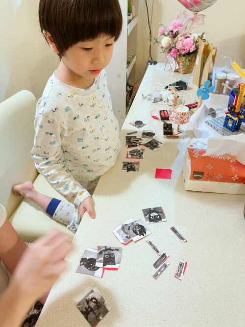 Piersce invented his own card game that doubles as snap cards and a memory game. He did the cards all by himself. He Googled for his favourite PJ Masks characters, printed them, cut them out and stuck them on the cards. 