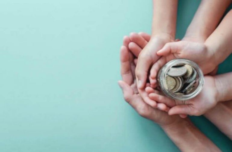 Making donation to give to the poor