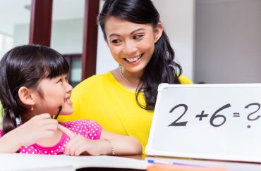 mom-teaching-daughter-math