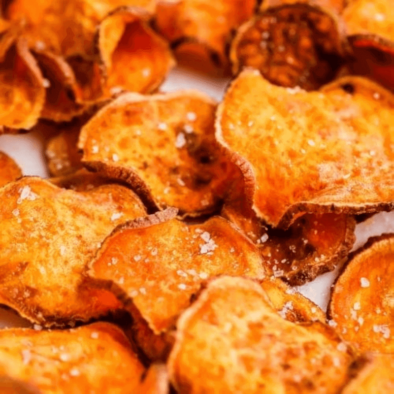 The sweet potato chips are prepared with an air fryer.