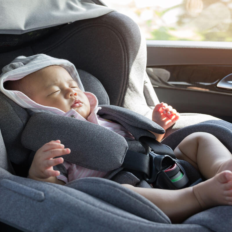 baby sleeping in car