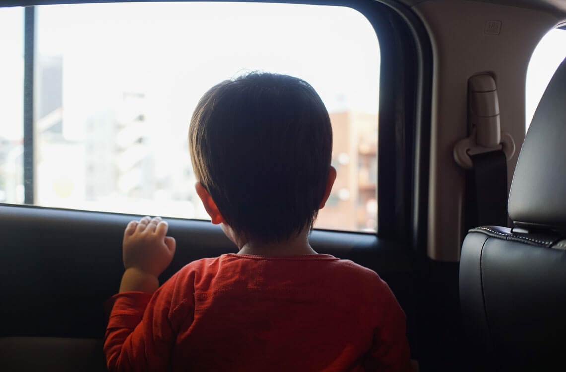 boy-looking-out-window