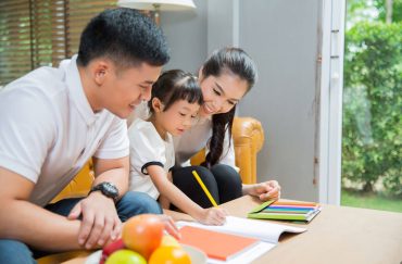 parents teaching child