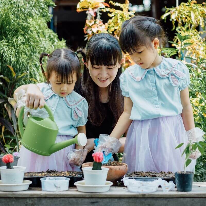 Mother and daughter gardening activity