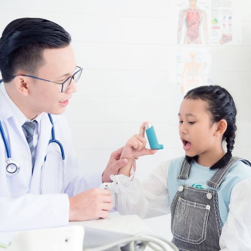 asthmatic child with a doctor