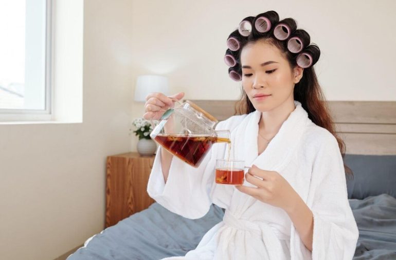 woman holding herbal tea