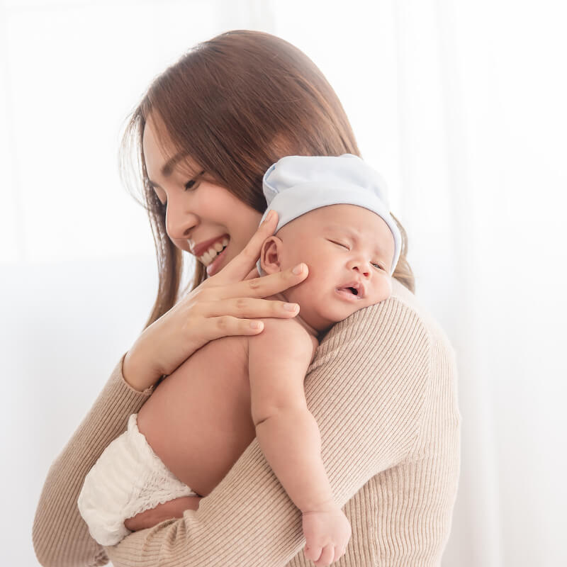 pregnant mum and newborn with insurance