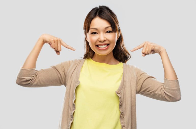 A mum pointing to herself