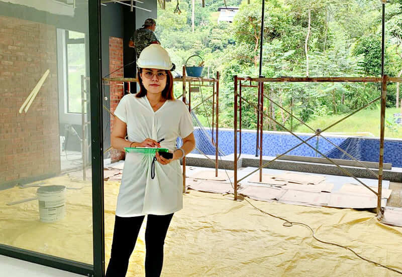 Ar. Teh Woan Cian visiting an on-going construction of a project on a typical site inspection day.