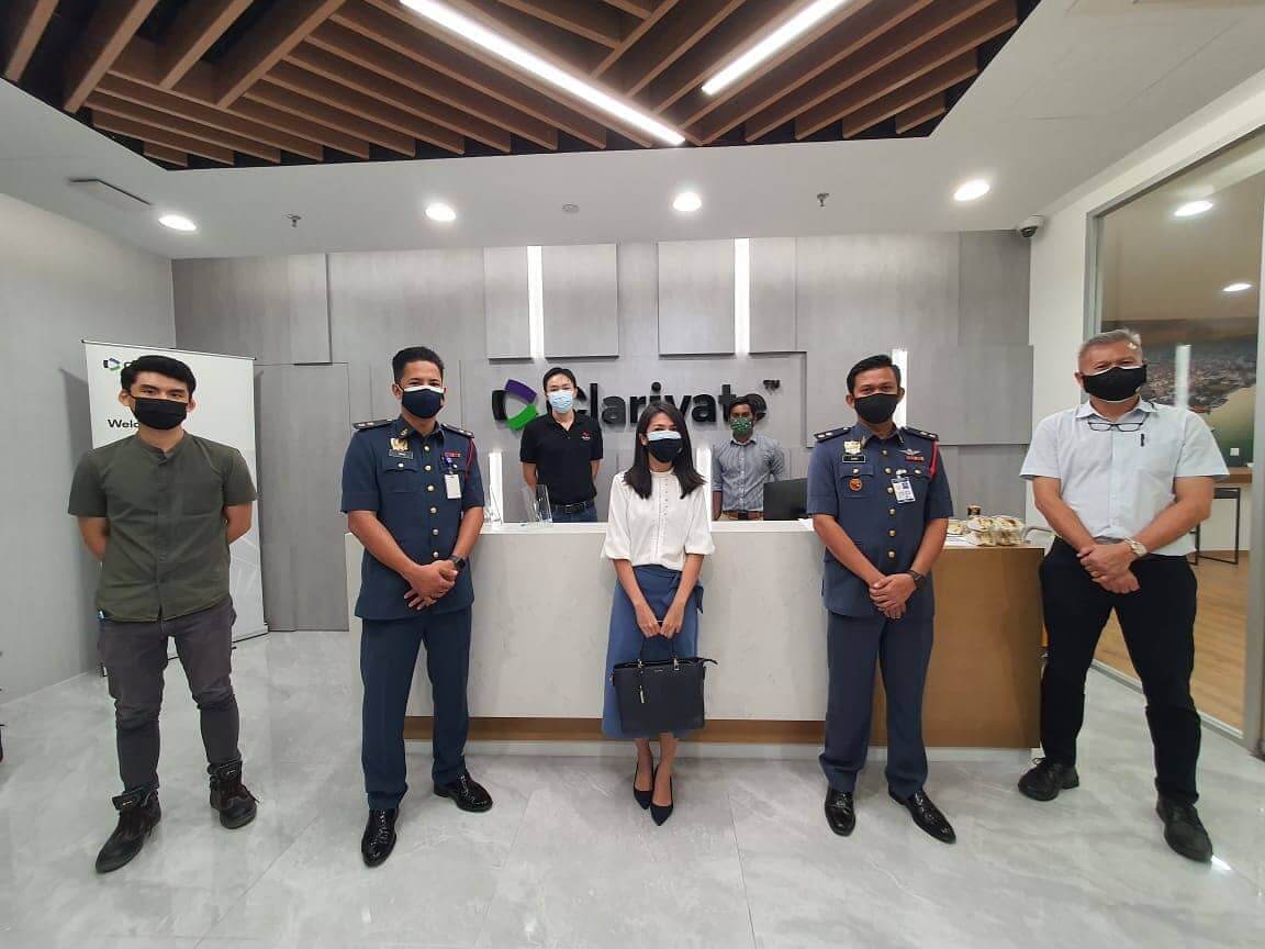 At the end of a site inspection of a newly-completed office building. Mei Ee is flanked by Bomba personnel. They have to first give clearance before an architect can issue the Certificate of Compliance and Completion.
