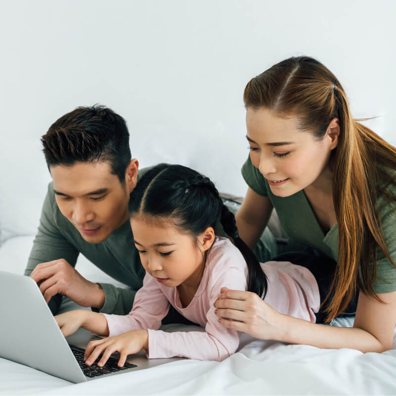 Parents helping their kids online