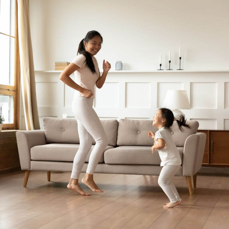 mother dancing with daughter