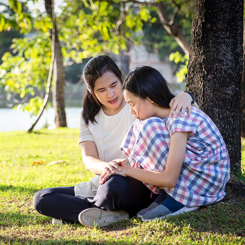 mom-comforing-girl