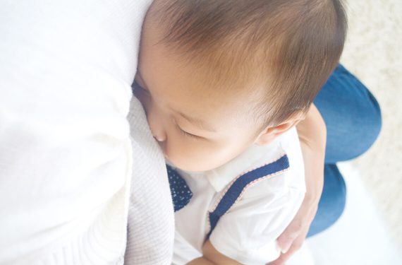 A toddler on extended breastfeeding