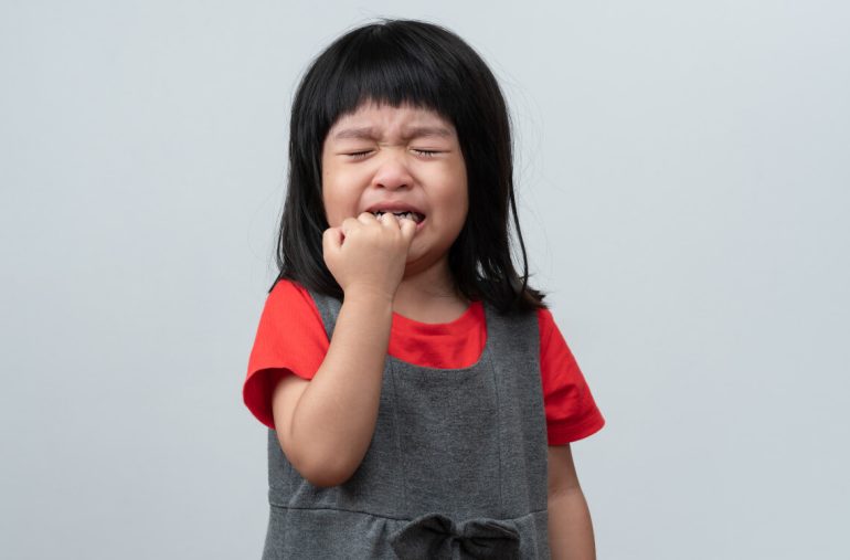 A girl is being a difficult child