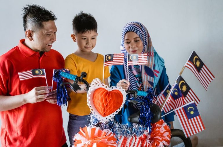 A family celebrating Merdeka Day