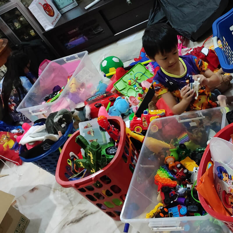 Kids sorting out toys