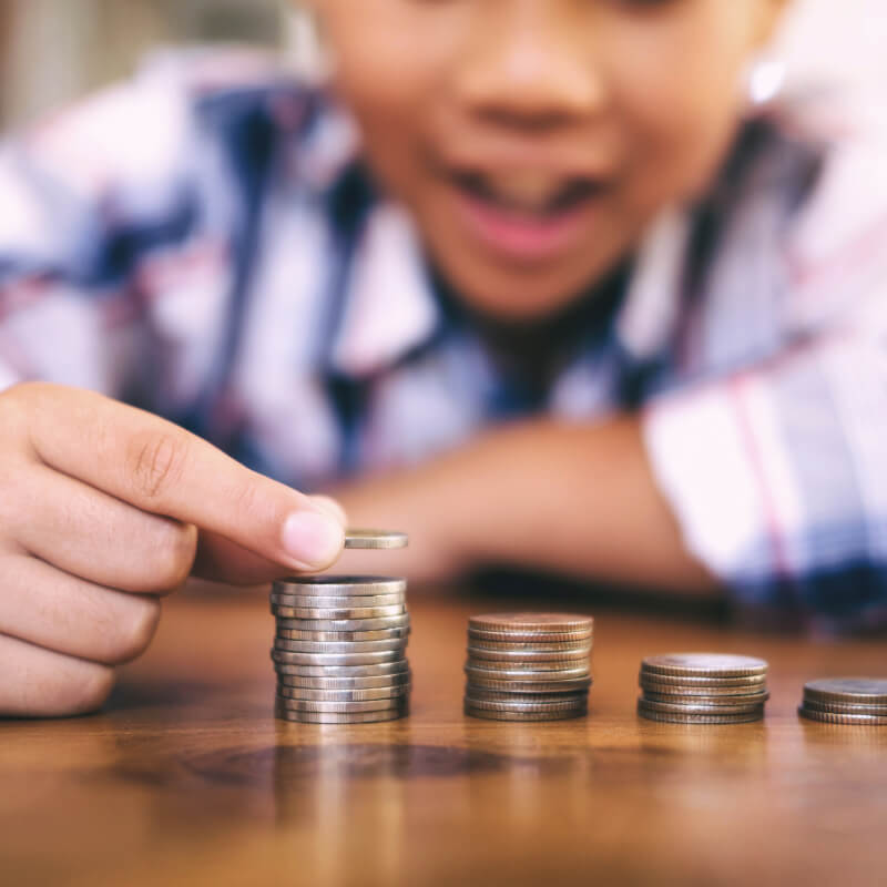 A boy counting his money