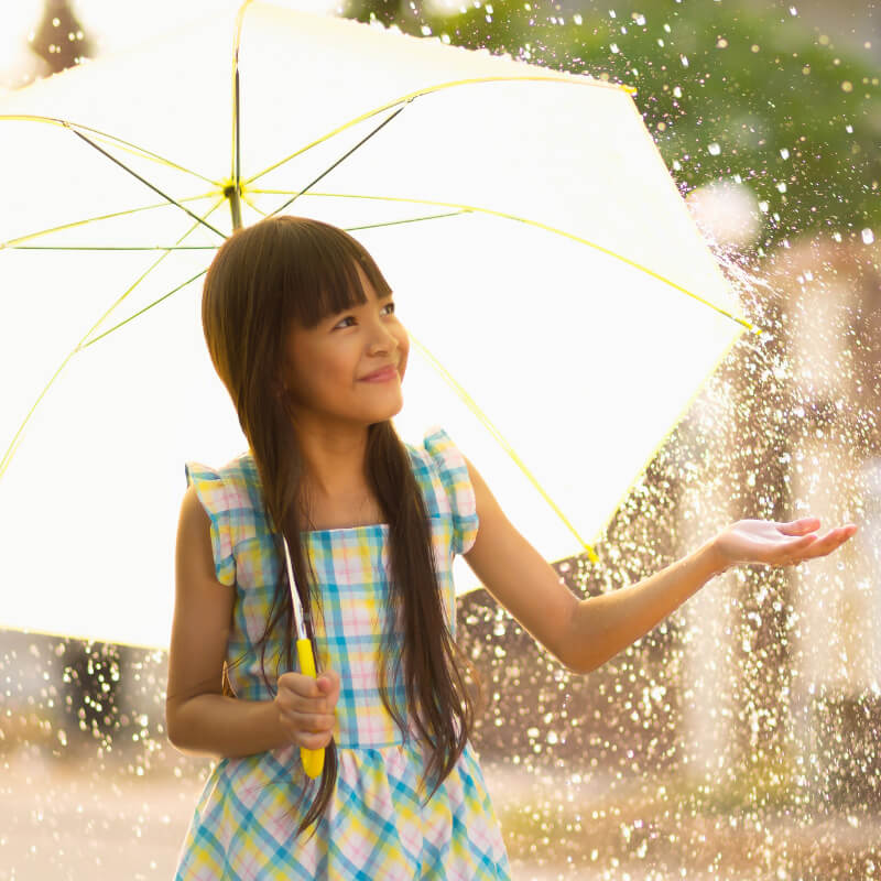 A girl using an umbrella