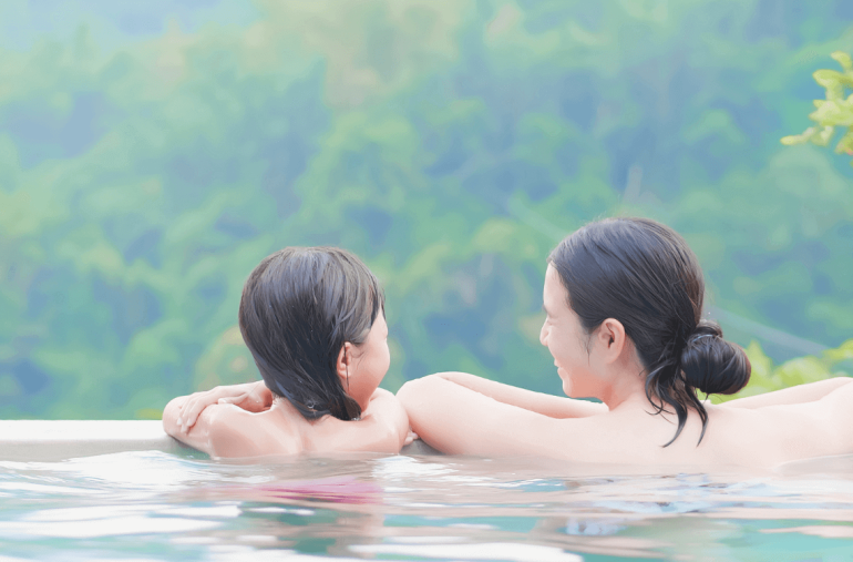 A Mother and Daughter Enjoying in Hot Spring of Ipoh